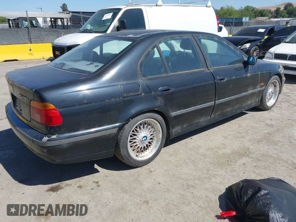 2000 BMW 5 Series 528i with VIN WBADM6349YGU29547, listed as a IAAI auction lot 42138468 with 207,469 mi miles and . Bid and sale history available at DreamBid. Image 4.