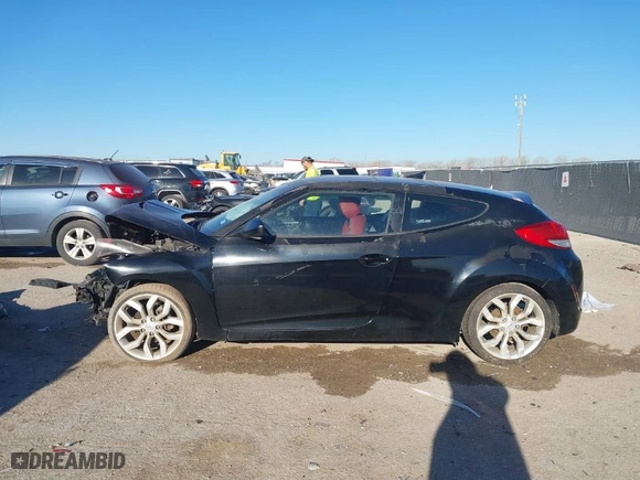 2012 Hyundai Veloster w/Gray Int with VIN KMHTC6AD6CU046899, listed as a IAAI auction lot 41804550 with 105,686 mi miles. Bid and sale history available at carsss.com. Image 14.