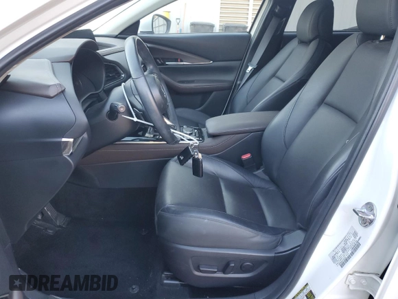 2020 Mazda CX-30 Premium with VIN 3MVDMAEMXLM102106, listed as a Copart auction lot 82964204 with 31,777 mi miles and Salvage title. Bid and sale history available at DreamBid. Image 7.
