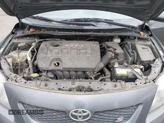 2009 Toyota Corolla with VIN 1NXBU40E39Z065572, listed as a IAAI auction lot 42138980 with 195,822 mi miles. Bid and sale history available at carsss.com. Image 10.