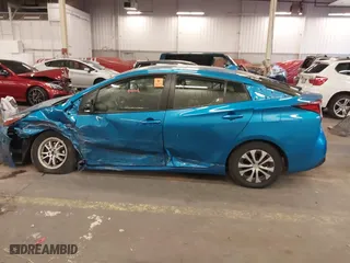 2022 Toyota Prius LE with VIN JTDL9MFU8N3032821, listed as a IAAI auction lot 40502056 with 70,009 mi miles. Bid and sale history available at carsss.com. Image 14.
