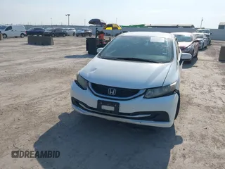 2014 Honda Civic LX z VIN 19XFB2F50EE013574, wystawiony jako IAAI lot #40497790 z przebiegiem 243 133 mil mil oraz . Historia ofert i sprzedaży dostępna na DreamBid. Obrazek 12.
