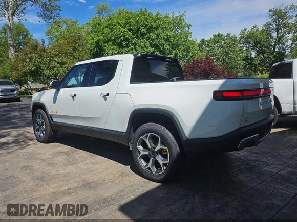 2023 Rivian R1T Adventure z VIN 7FCTGAAA1PN020478, wystawiony jako IAAI lot #42361936 z przebiegiem 443 mil mil oraz . Historia ofert i sprzedaży dostępna na DreamBid. Obrazek 3.