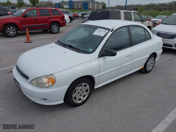 2002 Kia Rio with VIN KNADC123926185376, listed as a IAAI auction lot 42027348 with 84,893 mi miles. Bid and sale history available at carsss.com. Image 2.
