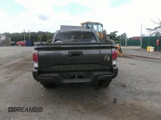 2021 Toyota Tacoma SR z VIN 3TYCZ5AN7MT017377, wystawiony jako IAAI lot #42285326 z przebiegiem 91 657 mil mil oraz . Historia ofert i sprzedaży dostępna na DreamBid. Obrazek 16.