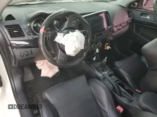 2014 Mitsubishi Lancer Evolution GSR with VIN JA32W8FV2EU019253, listed as a Copart auction lot 86615084 with 104,894 mi miles and Salvage Title. Bid and sale history available at carsss.com. Image 8.