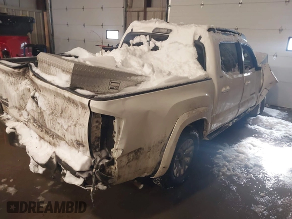 2016 Toyota Tacoma SR with VIN 3TMCZ5AN5GM004885, listed as a IAAI auction lot 41569409 with 143,951 mi miles. Bid and sale history available at carsss.com. Image 4.