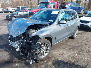 2025 BMW X5 xDrive40i with VIN 5UX23EU09S9W38011, listed as a IAAI auction lot 41600926 with 9 mi miles. Bid and sale history available at carsss.com. Image 2.