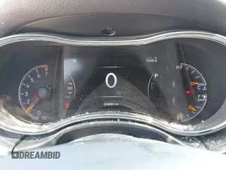 2020 Jeep Grand Cherokee Laredo E with VIN 1C4RJFAG0LC293050, listed as a IAAI auction lot 42566345 with 64,960 mi miles and . Bid and sale history available at DreamBid. Image 7.