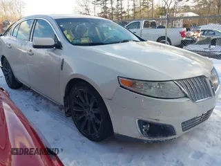 2009 Lincoln MKS with VIN 1LNHM94RX9G635375, listed as a IAAI auction lot 41393508 with 145,424 mi miles. Bid and sale history available at carsss.com. Image 1.