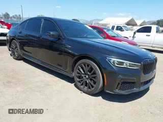 2022 BMW 7 Series 740i z VIN WBA7T2C04NCJ98730, wystawiony jako IAAI lot #42233272 z przebiegiem 70 976 mil mil oraz . Historia ofert i sprzedaży dostępna na DreamBid. Obrazek 1.