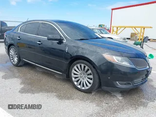 2013 Lincoln MKS z VIN 1LNHL9DK6DG609547, wystawiony jako IAAI lot #42212268 z przebiegiem 176 942 mil mil oraz . Historia ofert i sprzedaży dostępna na DreamBid. Obrazek 1.