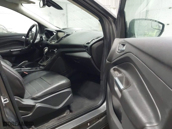 2014 Ford Escape Titanium with VIN 1FMCU9JX0EUB34228, listed as a IAAI auction lot 41713706 with 95,677 mi miles. Bid and sale history available at carsss.com. Image 5.