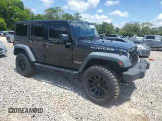 2015 Jeep Wrangler Unlimited Rubicon z VIN 1C4BJWFG2FL530863, wystawiony jako Copart lot #56345965 z przebiegiem 149 754 mil mil oraz Szkoda całkowita • Salvage title. Historia ofert i sprzedaży dostępna na DreamBid. Obrazek 4.