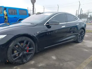 2018 Tesla Model S 75D with VIN 5YJSA1E42JF265691, listed as a IAAI auction lot 41886105 with 99,485 mi miles and . Bid and sale history available at DreamBid. Image 14.