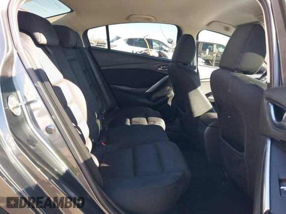 2016 Mazda 6 i Sport with VIN JM1GJ1U53G1400940, listed as a IAAI auction lot 41687400 with 77,737 mi miles and . Bid and sale history available at DreamBid. Image 8.