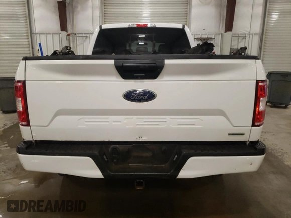 2020 Ford F-150 XL with VIN 1FTFW1E49LFC33659, listed as a Copart auction lot 52859575 with 104,623 mi miles and Salvage Title. Bid and sale history available at carsss.com. Image 6.