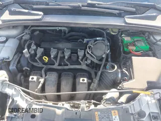 2015 Ford Focus SE with VIN 1FADP3K23FL261021, listed as a IAAI auction lot 42014802 with 157,283 mi miles. Bid and sale history available at carsss.com. Image 10.