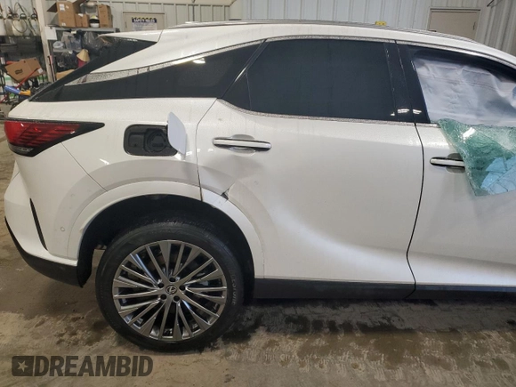2024 Lexus RX with VIN JTJCJMGA9R2015210, listed as a Copart auction lot 86268164 with Not Provided miles and Salvage Title. Bid and sale history available at carsss.com. Image 10.