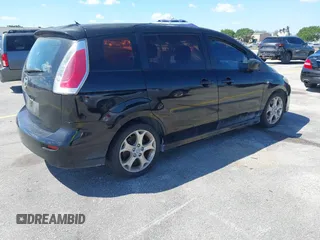 2009 Mazda 5 Sport with VIN JM1CR293290331607, listed as a IAAI auction lot 41907557 with 149,523 mi miles. Bid and sale history available at carsss.com. Image 4.