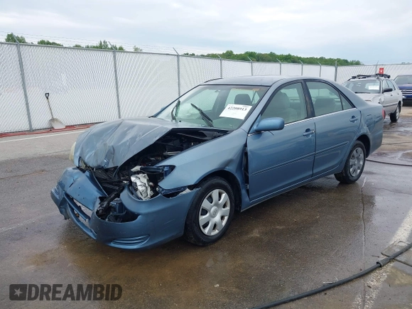 2002 Toyota Camry LE z VIN 4T1BE32KX2U617732, wystawiony jako IAAI lot #42208913 z przebiegiem Nie podano mil oraz . Historia ofert i sprzedaży dostępna na DreamBid. Obrazek 18.