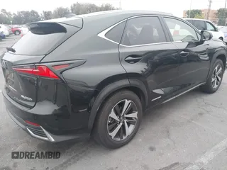 2021 Lexus NX 300h z VIN JTJGJRDZ5M2148354, wystawiony jako IAAI lot #42516204 z przebiegiem 42 803 mil mil oraz . Historia ofert i sprzedaży dostępna na DreamBid. Obrazek 4.