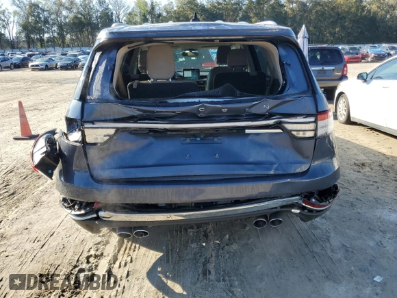 2021 Lincoln Aviator Reserve z VIN 5LM5J7WC9MGL01854, wystawiony jako Copart lot #88782765 z przebiegiem 87 789 mil mil oraz Nie do naprawy • Non repairable. Historia ofert i sprzedaży dostępna na DreamBid. Obrazek 6.