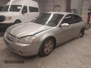 2004 Nissan Altima S with VIN 1N4AL11D14C119642, listed as a IAAI auction lot 41530422 with 98,613 mi miles. Bid and sale history available at carsss.com. Image 2.