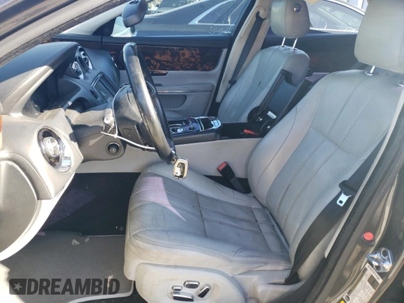 2012 Jaguar XJ with VIN SAJWA1CB7CLV33879, listed as a Copart auction lot 88708995 with Not provided miles and Salvage title. Bid and sale history available at DreamBid. Image 7.