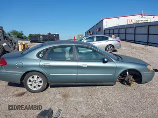 2005 Ford Taurus SEL z VIN 1FAFP56205A232164, wystawiony jako IAAI lot #42201770 z przebiegiem 115 406 mil mil oraz . Historia ofert i sprzedaży dostępna na DreamBid. Obrazek 15.