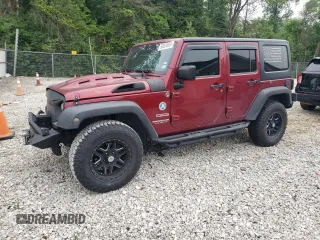 2012 Jeep Wrangler Unlimited Sport with VIN 1C4HJWDG7CL215064, listed as a Copart auction lot 60934555 with 131,634 mi miles and Salvage title. Bid and sale history available at DreamBid. Image 1.