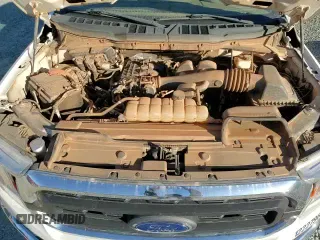 2021 Ford F-150 XL с VIN 1FTEX1EB1MKE44046, выставлен на аукционе Copart как лот 83668514 с пробегом 85 819 миль миль и Списание • Salvage title. История ставок и продаж доступна на DreamBid. Изображение 14.
