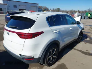 2020 Kia Sportage LX with VIN KNDPMCAC4L7792355, listed as a IAAI auction lot 41433828 with 67,139 mi miles. Bid and sale history available at carsss.com. Image 4.