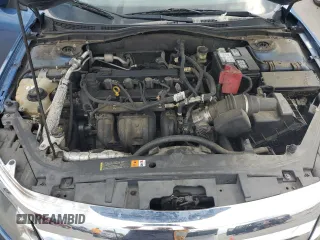 2010 Ford Fusion SE z VIN 3FAHP0HA2AR208559, wystawiony jako Copart lot #64288565 z przebiegiem 186 231 mil mil oraz Czysty tytuł • Clean title. Historia ofert i sprzedaży dostępna na DreamBid. Obrazek 11.