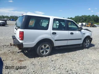 1997 Ford Expedition XLT with VIN 1FMEU17L2VLB74797, listed as a Copart auction lot 61377745 with 236,140 mi miles and Salvage title. Bid and sale history available at DreamBid. Image 3.