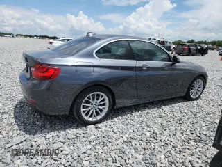 2015 BMW 2 Series 228i xDrive with VIN WBA1F7C5XFV367659, listed as a Copart auction lot 58855145 with 50,848 mi miles and Salvage title. Bid and sale history available at DreamBid. Image 3.