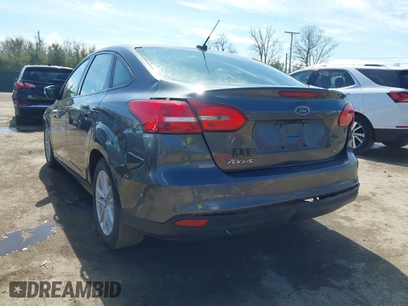 2017 Ford Focus SE with VIN 1FADP3F26HL229452, listed as a IAAI auction lot 41882192 with 83,499 mi miles. Bid and sale history available at carsss.com. Image 6.
