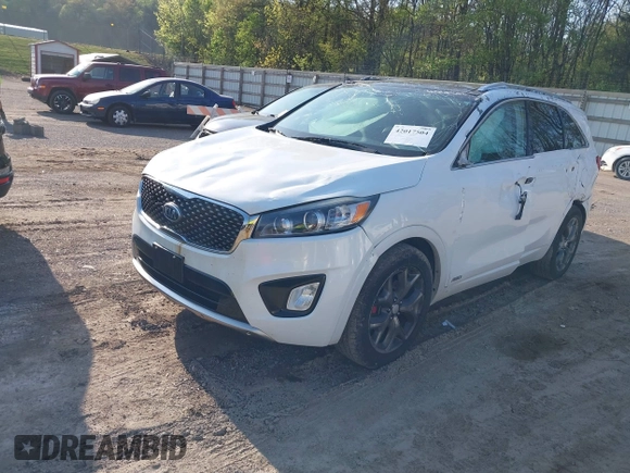 2016 Kia Sorento SX with VIN 5XYPKDA51GG072940, listed as a IAAI auction lot 42017504 with 110,897 mi miles. Bid and sale history available at carsss.com. Image 2.