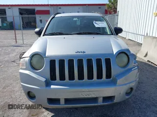 2007 Jeep Compass Sport with VIN 1J8FT47W57D185807, listed as a IAAI auction lot 41700283 with 194,339 mi miles. Bid and sale history available at carsss.com. Image 12.