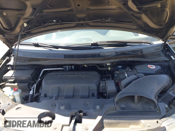 2014 Honda Odyssey Touring with VIN 5FNRL5H99EB133864, listed as a IAAI auction lot 42201359 with 122,490 mi miles and . Bid and sale history available at DreamBid. Image 10.