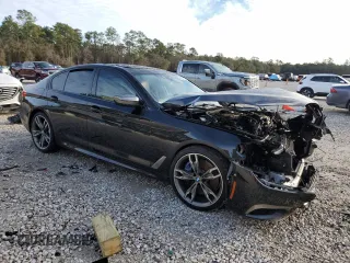 2020 BMW 5 Series M550i xDrive with VIN WBAJS7C01LCD23365, listed as a Copart auction lot 88302885 with Not provided miles and Salvage title. Bid and sale history available at DreamBid. Image 4.