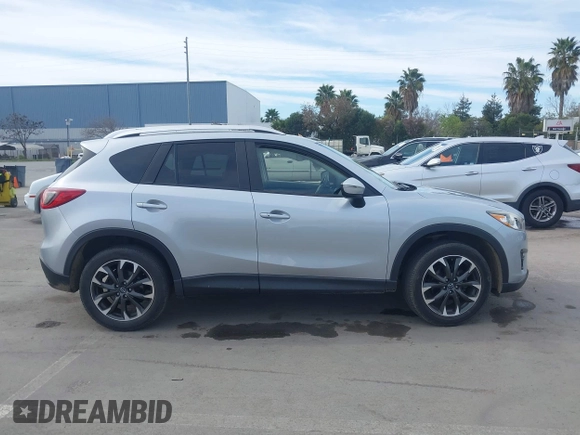 2016 Mazda CX-5 Grand Touring with VIN JM3KE2DY9G0723921, listed as a IAAI auction lot 41681522 with 83,893 mi miles. Bid and sale history available at carsss.com. Image 13.