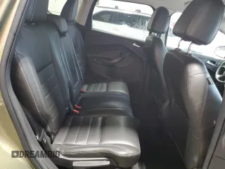 2013 Ford Escape SE z VIN 1FMCU9GX0DUA43966, wystawiony jako Copart lot #66152725 z przebiegiem 122 498 mil mil oraz Czysty tytuł • Clean title. Historia ofert i sprzedaży dostępna na DreamBid. Obrazek 11.