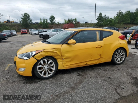 2012 Hyundai Veloster w/Black Int with VIN KMHTC6AD9CU027490, listed as a Copart auction lot 60211855 with 113,836 mi miles and Salvage title. Bid and sale history available at DreamBid. Image 1.