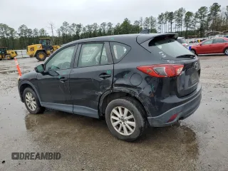 2014 Mazda CX-5 Sport with VIN JM3KE2BEXE0378744, listed as a Copart auction lot 86397414 with 101,011 mi miles and Salvage Title. Bid and sale history available at carsss.com. Image 2.