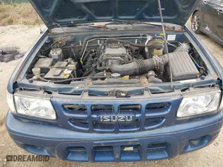 2002 Isuzu Rodeo S with VIN 4S2CK58W124320988, listed as a IAAI auction lot 41921874 with 227,320 mi miles. Bid and sale history available at carsss.com. Image 10.