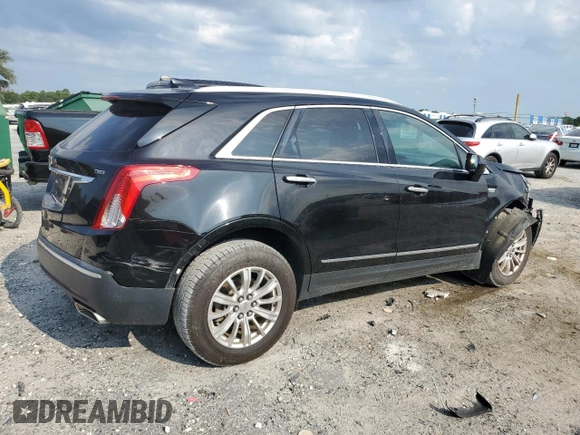 2017 Cadillac XT5 FWD with VIN 1GYKNARS0HZ283618, listed as a Copart auction lot 61640005 with 113,823 mi miles and Salvage title. Bid and sale history available at DreamBid. Image 3.