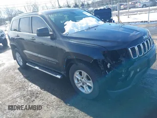 2017 Jeep Grand Cherokee Laredo with VIN 1C4RJEAGXHC685888, listed as a IAAI auction lot 41563643 with 193,997 mi miles. Bid and sale history available at carsss.com. Image 1.