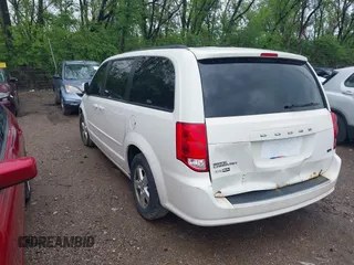2012 Dodge Grand Caravan SXT with VIN 2C4RDGCG4CR145484, listed as a IAAI auction lot 42127663 with 278,872 mi miles and . Bid and sale history available at DreamBid. Image 3.