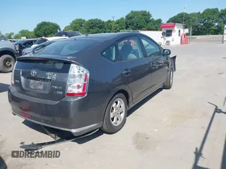 2008 Toyota Prius with VIN JTDKB20U883344493, listed as a IAAI auction lot 42002921 with 552,761 mi miles. Bid and sale history available at carsss.com. Image 4.